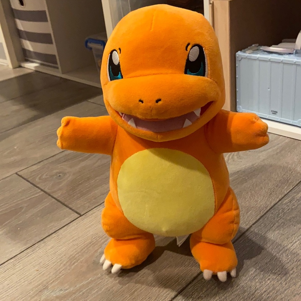 A talking Pokémon Charmander plush doll